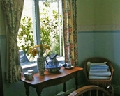 private guest sitting room with TV.